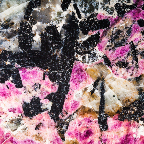 Closeup of Aegirine in Eudialyte raw crystal