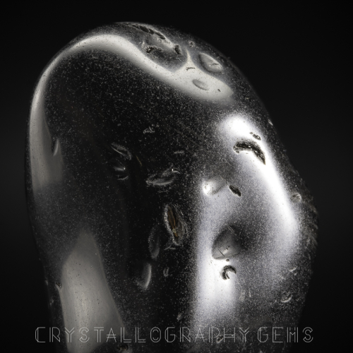 Closeup of Apache Tears raw crystal