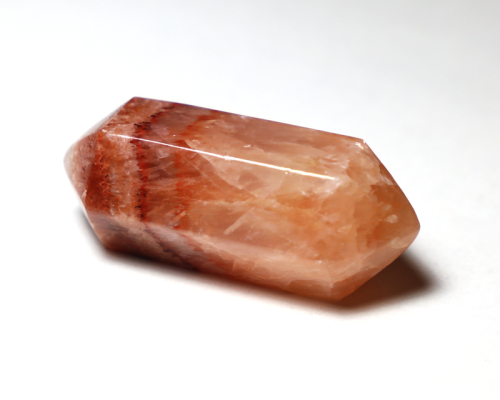 Red Aragonite polished crystal