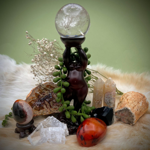 clear quartz sphere goddess carnelian crystallography gems